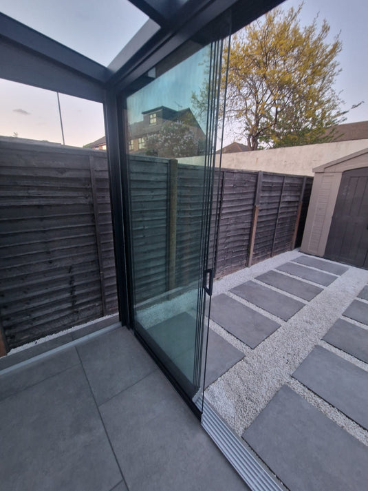 Deponti Skyline Terraza con solárium de vidrio y aluminio